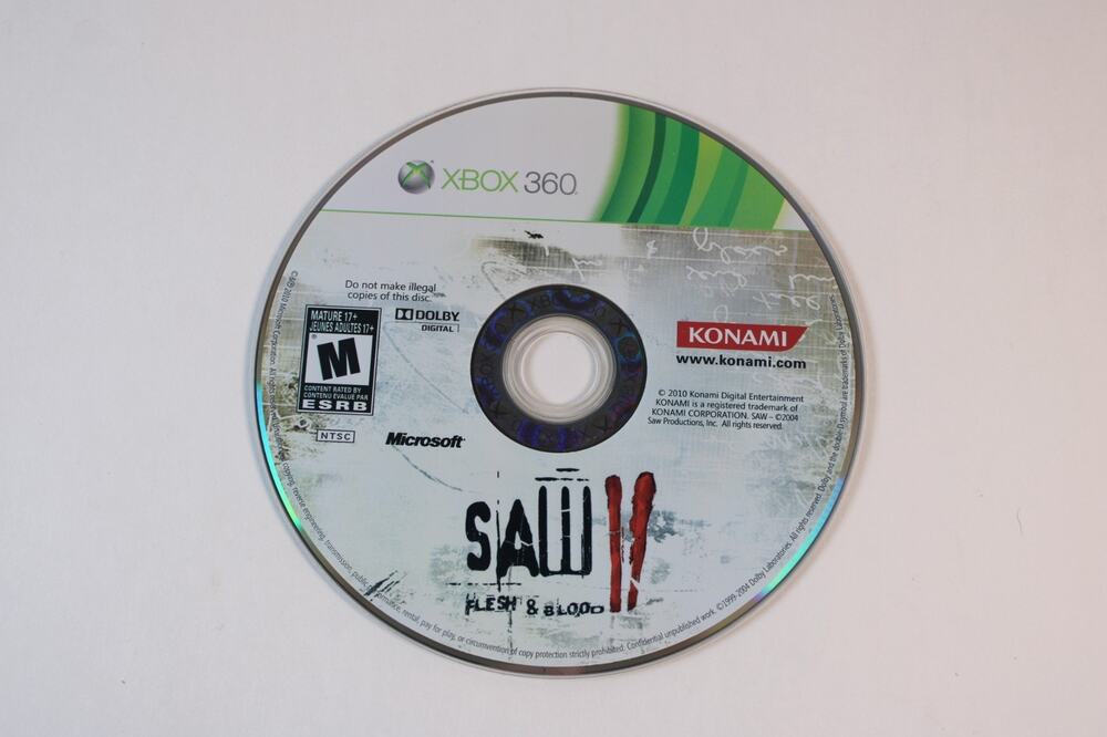 Saw II: Flesh & Blood (Microsoft Xbox 360, 2010) Authentic, Game Disc Only